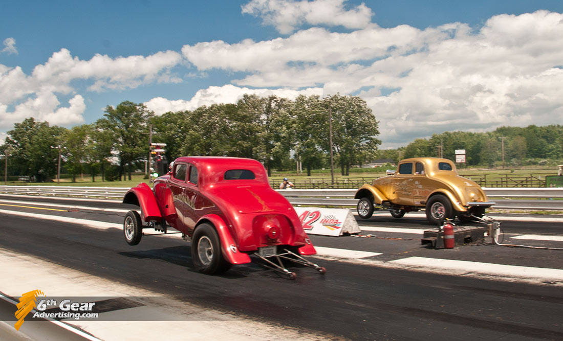 Pair of Gassers drag racing at Rock and Race